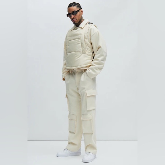 Roller Coaster Puffer Vest" in Off White from the brand Fashion Nova. - Picture 2 of 10